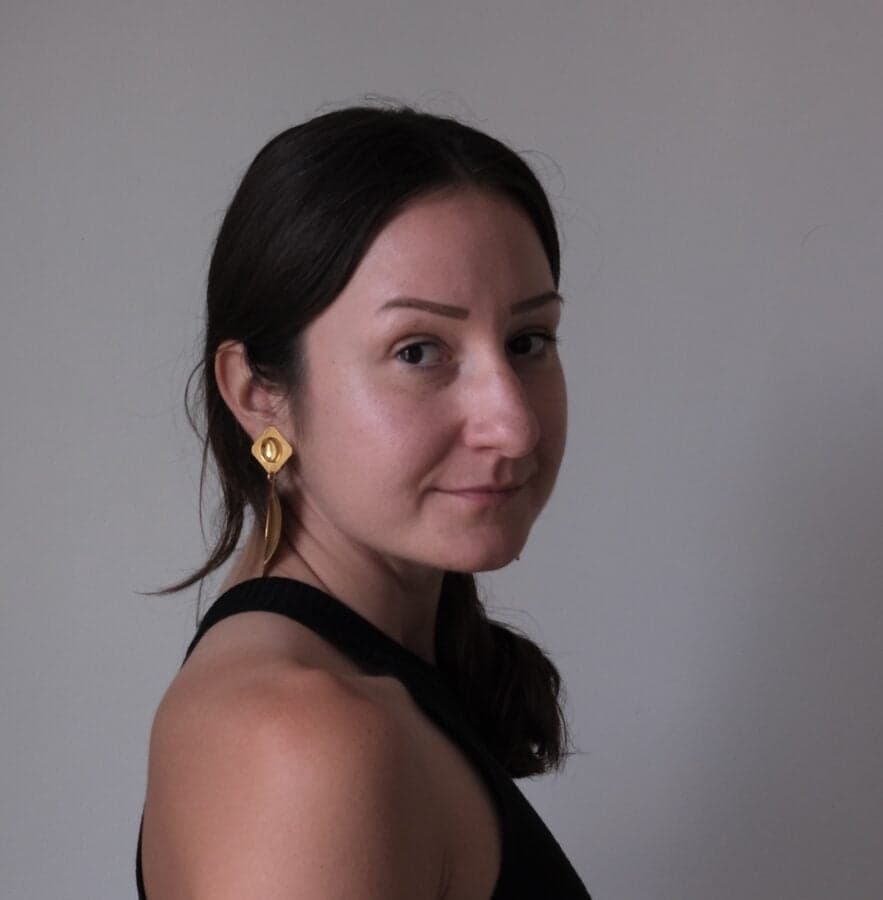 lidija, looking back over her shoulder